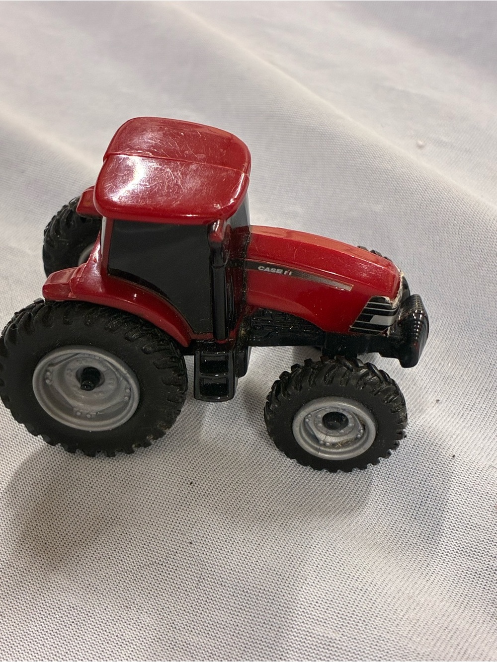 Case Mini Red Tractor
- Play wear